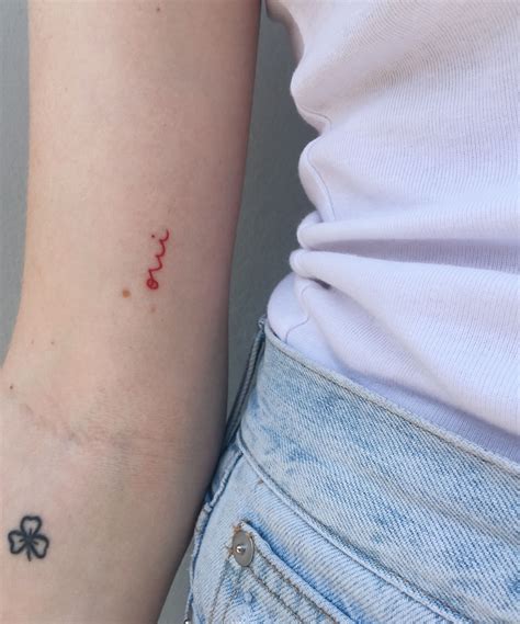 small red tattoos